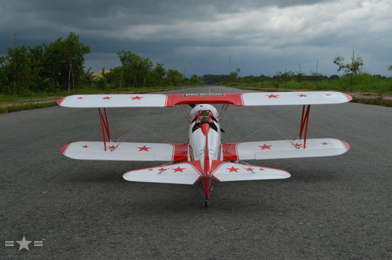 back view of red baron rc plane looking down a runway