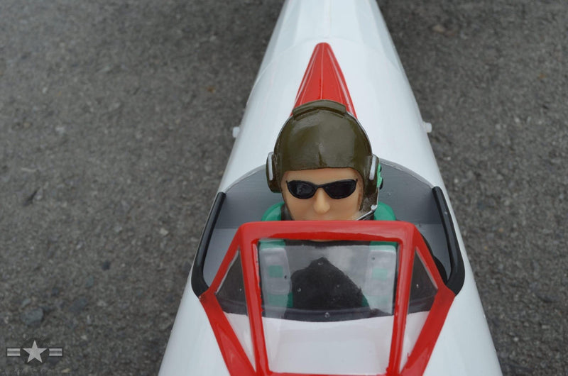 view of pilot figurine in a red baron rc plane