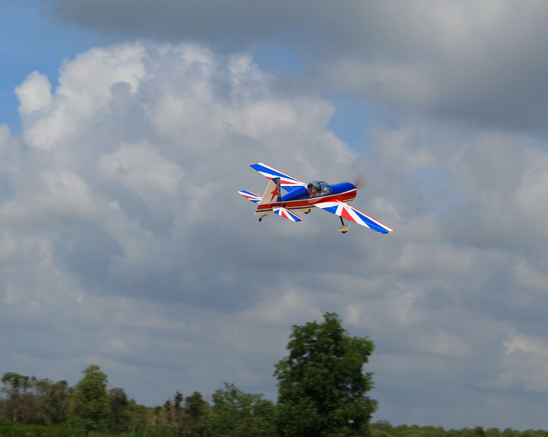back view of YAK 54, 3D 64" (ARF) in the air