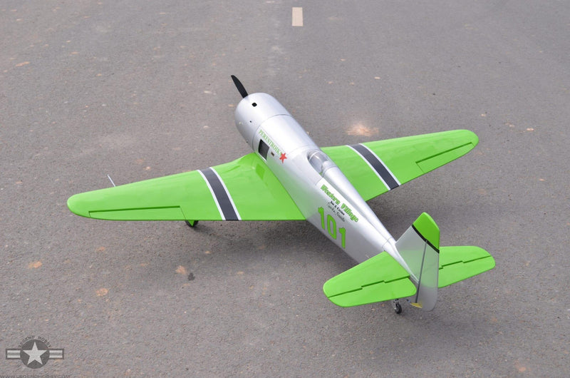 view of Reno Air Care YAK-11 on a runway