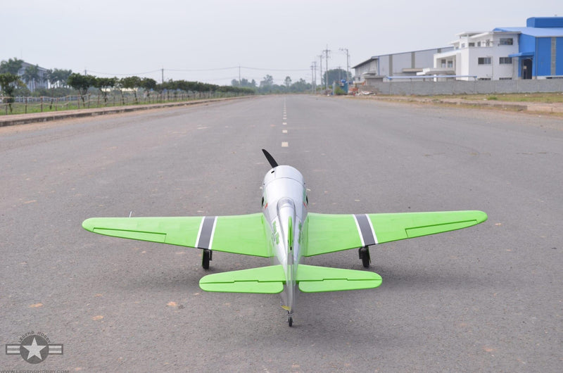 back view of Reno Air Care YAK-11 on a runway