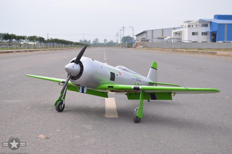 side view of Reno Air Care YAK-11 on runway